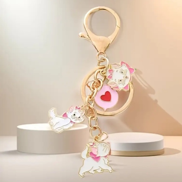 NIP! Disney’s Marie from the Movie The Aristocats as a Keychain / Purse Charm! - Picture 1 of 1